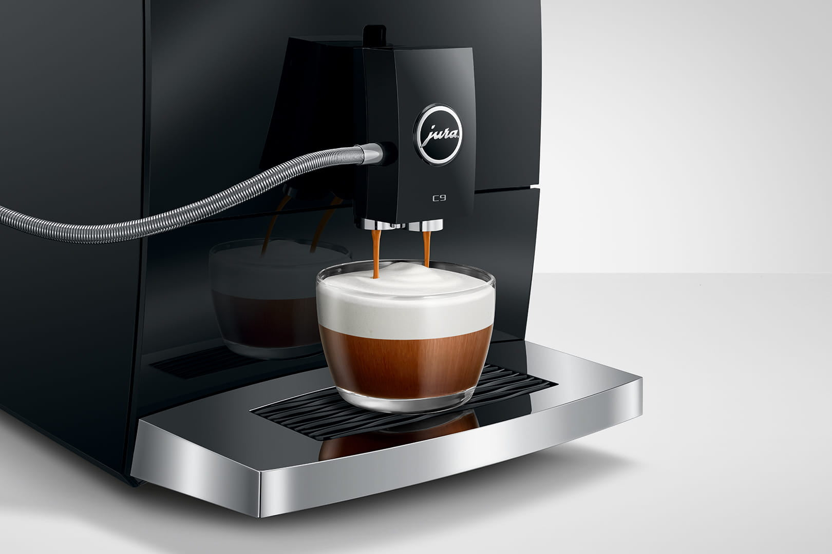 Jura C9 making a cappuccino